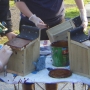 Applying preservative to completed nestboxes