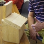 Thumbs up on nest box timber cuts